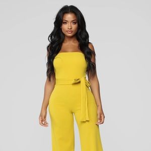 Yellow jumpsuit in Size medium.